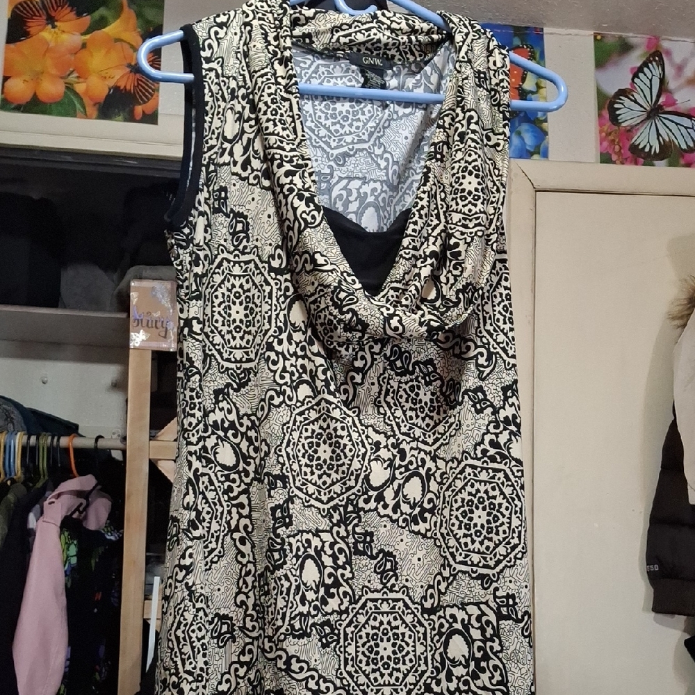 Black and White Asymmetrical Sleeveless Blouse